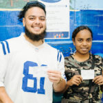 Musical stars Isaiah ‘Zeah’ Kramer and Rosie Delmah show off their CDC-RMI Covid vaccine cards following their vaccination by public health staff at the College of the Marshall Islands last week. Photo: Chewy Lin.