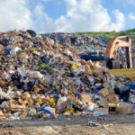 The tall and getting taller pile of waste is closing in on the Batkan dump’s entrance every day as the landfill maxed out its available space several years ago