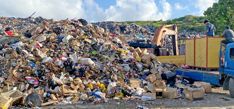 Dump overflows toward road