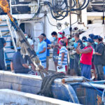 Fishermen on a purse seine vessel in Majuro lined up to get their Covid vaccines as the Ministry of Health and Human Services rolled out vaccines for fishermen this past week. Photo: Marshall Islands Marine Resources Authority.