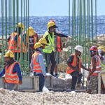 More than just landfill is beginning to take shape at the Jenrok ocean side area, with hardworking Pacific International Inc. workers putting in foundations of what will become a track and field area as well as a baseball field replete with bleachers. Photo: Wilmer Joel.