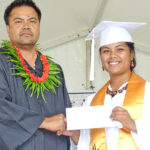 CMI Executive Vice President William Reiher with the CMI nursing program’s top graduate Alma Capelle. Photo: Wilmer Joel.