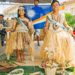 11th graders Goodwin Silk and Maryann Kiluwe bask in the glory of being named the Marshall Islands High School’s King and Queen for 2021. Photo: Chewy Lin.