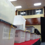 During the special election vote tabulation process at the ICC in Majuro, that started the night of August 21, votes cast for the various islands were lined up on the stage to await review and counting.