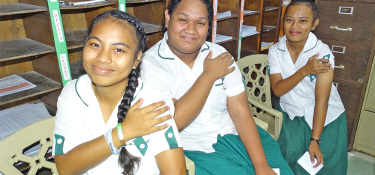 Students line up for Covid shots