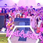 Attendees at the fourth annual Pink Tea Party in Majuro joined together for a group photo. Photo: Eve Burns.