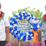 At the gravesite of first President Amata Kabua for the annual November 17 Presidents Day commemoration, from left: The founding father’s sons Minister Jiba Kabua and President David Kabua. Photo: Wilmer Joel.