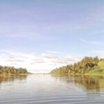 This file photo of the Kili Island runway shows the entire airfield flooded from an ocean inundation event in 2015. Ocean flooding and rain have caused deterioration of the runway over time.
