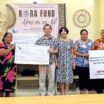 At the Kora Fund initial loan ceremony last week, from left: Teri Elbon, Jennifer Hawley, recipient Alma Abin, Ambassador Jeffrey Hsiao and his wife Jasmine, Velma Edwards, Patrick Chen and David Lin. Photo: Eve Burns.