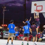 juro Co-op High School player Jonathan “Jonjon” Hawley skies to the rim for a shot in the first game at the new Assumption court Tuesday. Co-op won 73-40