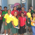 The Jaluit High School team in green uniforms won the science Jeopardy competition during Education Week activities. They also competed with other outer island high school teams, pictured here, from Kwajalein Atoll High School, Eniburr (Santo) High School, and Northern Islands High School in a Jeopardy competition focused on the Compact of Free Association.