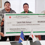 Laura High School Principal Jimmy Kemem, left, at the grant signing ceremony with, from left, PSS Associate Commissioner for Property and Maintenance Cassiano Jetnil, Associate Commissioner for Secondary and Career Education Junior Paul, and Japan Ambassador Kazunari Tanaka.