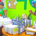 NTA customers flooded the telecom with their modems Saturday in response to a text message from NTA to bring modems in so they could be reconfigured to restore internet service. Photo: Wilmer Joel.