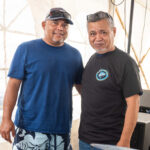 MIMRA Director Glen Joseph, right, with tuna carving competitor Rudol Muller and a sizable yellowfin tuna ahead of the World Tuna Day competition. Photo: Chewy Lin.