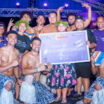 Australian Embassy Deputy Chief of Mission Katrina Murray and Power 103.5FM owner dance competition organizer Daniel Kramer hold the ceremonial $900 grand prize for Team Tapa Nesians that won the radio station’s sixth anniversary dance extravaganza last Saturday night at Delap Park. Photo: Chewy Lin.