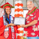 Graduation keynote speaker Jerry Kramer congratulates Coop High School valedictorian Isabella Narruhn during the May 28 graduation in Majuro. Photo: Chewy Lin.