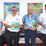 MIMRA staff joined with President David Kabua to present new publications, including the Field Guide to the Corals of the Marshall Islands.” At the presentation, from left: Emma Kabua-Tibon, MIMRA Director Glen Joseph, President Kabua and Benedict Yamamura. Photo: Wilmer Joel.