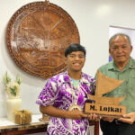 Michael Loeak, the first Marshallese to be accepted to the Air Force Academy, came to Majuro last week at the invitation of President David Kabua, who presented him with an outrigger canoe model in his honor. Photo: Hilary Hosia.