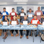 The 16 participants in the Pacific Media Institute-sponsored workshop, Telling Your Pacific Story, after the June 24 wrap up of the two-week program. With them are PMI directors Giff Johnson, standing left, and Daniel Kramer, standing right. The workshop was supported by Australia’s PACMAS program, CMI, USP, the US Embassy and the ROC/Taiwan Embassy. Photo: Chewy Lin.