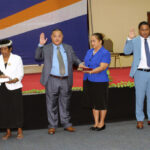 At the swearing in ceremony June 7 at the International Conference Center, from left: Nitijela Members Jack Ading, Ota Kisino and Joe Bejang with their spouses holding the bibles as they took the oath of office for the Cabinet. Photo: Eve Burns.