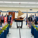 he first in-person negotiating session to renew provisions of a Compact of Free Association between the United States and the Marshall Islands took place at the US Army base at Kwajalein June 14-16. US Ambassador Joseph Yun is in the front of the US negotiation team at left in the photo next to the US flag, while Marshall Islands Foreign Minister Kitlang Kabua stands next to a Marshall Islands flag with her negotiation group. Photo: Courtesy of Ministry of Foreign Affairs and Trade.