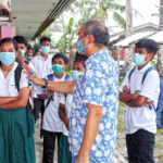 At Monday’s orientation session at MIHS for pre-nine students, pre-nine counsellor Roderick Concepcion introduced students to their teacher Jojo Taala, standing at left. Photo: Wilmer Joel.