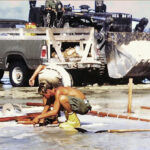 Workers in 1977 began clean up activity at Enewetak Atoll and construction activity at Runit Island that would lead to the building of what is now known as the Runit Dome. They rarely used protective gear despite working at the ground zero for 43 nuclear weapons tests. Photo: Alan Leeman.