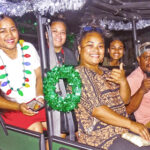 Miss Kwajalein Dorine Laura Korwan joined in on the Christmas parade on Ebeye December 13 with her own custom-made trailer attached to a Kawasaki mule. Photo: Hilary Hosia.