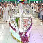 The Lokonmok jepta’s recreation of the Morning Star vessel filled with dollar bills, cases of ramen and other gifts as part of their donation to Rita Protestant Church during the Gospel Day celebrations December 4. Photo: Wilmer Joel.