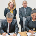 Under the watchful eyes of Interior Assistant Secretary Carmen Cantor and RMI Ambassador Gerald Zackios, Ambassador Joseph Yun and Minister Kitlang Kabua sign the Compact MOU last week in Los Angeles.