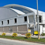 The roof is on the ECC gym in Delap and construction work is now focused on renovating locker rooms, offices and readying the floor for installation of a wood playing surface. Photo: Giff Johnson.