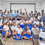 Miss Marshall Islands Claret Chong Gum, center yellow blouse with blue sash, visited with Assumption High School students during Education Week — one of several schools that she and other Miss Marshall Islands pageant contestants visited during the week.