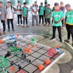 MIT Lincoln Laboratory’s Sarah Willis, right, assisted the robotics program on Ebeye that saw dozens of students join in. Photo: Deo Keju.