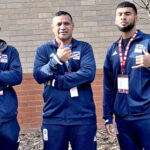 RMI wrestlers in Australia, from left: Meinshu Peter Jiang, Coach Waylon Muller and Ricktak RJ Iban Jr.