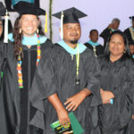 Huswynn Abo, left, and three other University of Hawaii graduates, Rod Lanwe, Luislynn Katmel, and Mercy Calimlim, who were and are affiliated with Northern Islands High School, are pictured at their graduation last month in Majuro with former NIHS employee Dr. Natalie Nimmer, second from left. Natalie is now the associate director for the Pacific Masters in Education program at the University of Hawaii-Manoa, which the four graduated from late last month. Photo: Wilmer Joel.