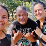 Chantelle Matagi of Papa Ola Lokahi, Jendrikdrik Paul, the Executive Director MCOH, and Shanty Asher of the Pacific Islander Liaison and Office of Economic Revitalization for the City and County of Honolulu on Maui for the “resource fair” for fire victims.
