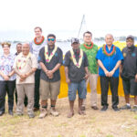 A large group of people, including President David Kabua (sixth from right), helped graduates from Namu, Wotje, and and Maloelap celebrate their graduation at Waan Aelon in Majel and the completion of three new WAMCats that will be shipped to their atolls. Photo: Chewy Lin.