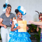 At the IOM Diversity Festival last weekend, from left: Keola Diaz, Amokai Kyle Diaz (Best Traditional Costume second place representing Palau), Pau Maitokana (Best Recycle wear third place), Bale Maitokana (Best Recycle wear second place and Best Female model), Cyan Enriquez (Best Traditional Costume first place representing Philippines) carried by Mum Dolly Enriquez, and IOM’s Angela Saunders. Photo: Chewy Lin. 