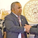 RMI Ambassador Charles Paul is congratulated by President David Kabua, right, following the oath of office ceremony at the RMI Embassy in Washington, DC in late September.