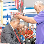 Rev. Bender Loeak, son of Christopher Loeak’s older brother the late Iroojlaplap Anjua Loeak, places the crown on the new iroojlaplap’s head during the coronation ceremony. Photo: Chewy Lin.