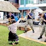 If the Pacific Partnership Fleet Band members were standing for office in the November 20 national election, we think this photo suggests the outcome. Photo: Wilmer Joel.