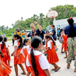 US Navy representatives danced with Laura Elementary Students to the rocking sounds of the Navy Fleet Band earlier in the week. The program was part of the two-week Pacific Partnership visit. Photo: Eve Burns.