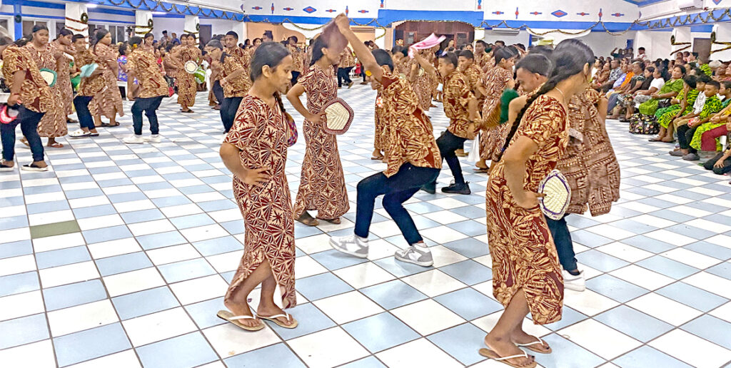 Marshall Christian High School performed a Western-style biit dance Christmas Day at Uliga Protestant Church. Photo: Hilary Hosia.