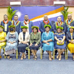 President Hilda Heine, seated center, is surrounded by her new Cabinet ministers and their wives following a swearing in ceremony January 9 at the International Conference Center. Photo: Wilmer Joel.
