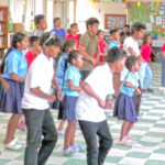 Under the direction of choreographer Ilona Bito, right, cast members of Oliver! Work on their dance moves during a rehearsal at Marshall Islands High School this past week. Photo: Gary Erhsam