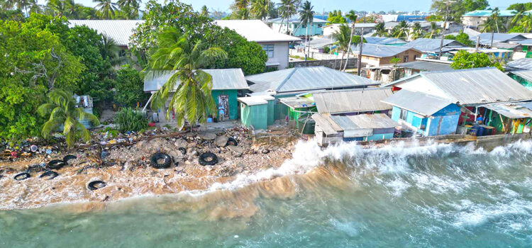 A drone shot of the Delap home that is desperately in need of a seawall. Photo: Carl Montgomery. Ocean flooding hits RMI