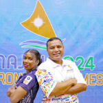 Mattie Sasser and Waylon Muller pose at the International Conference Center Wednesday: They are the two most-medaled Marshall Islands athletes in history. Mattie will compete for the RMI weightlifting team Monday and Tuesday next week at the ICC, while Waylon — who won his first medal in regional competition in Samoa in 1991 before winning golds in multiple Micronesian Games — is coaching the RMI wrestling team, which competes for three days, June 22-24. Mattie has set numerous lifting records in Oceania competitions and represented the RMI at the Rio Olympic Games in 2016, qualifying on her own merits. Photo: Hilary Hosia.