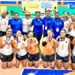 The Marshall Islands volleyball team in the MIHS gym following its defeat of Team Palau to win the gold medal in the Micro Games June 23. Photo: Chewy Lin.