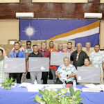 Mayors receive boxes of Starlink hardware donated by the Marshall Islands Red Cross Society. Photo: Hilary Hosia.