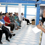 Post-Concon public educator Winnie Benjamin speaks to congregation members at Uliga Church last week. Photos: Hilary Hosia.